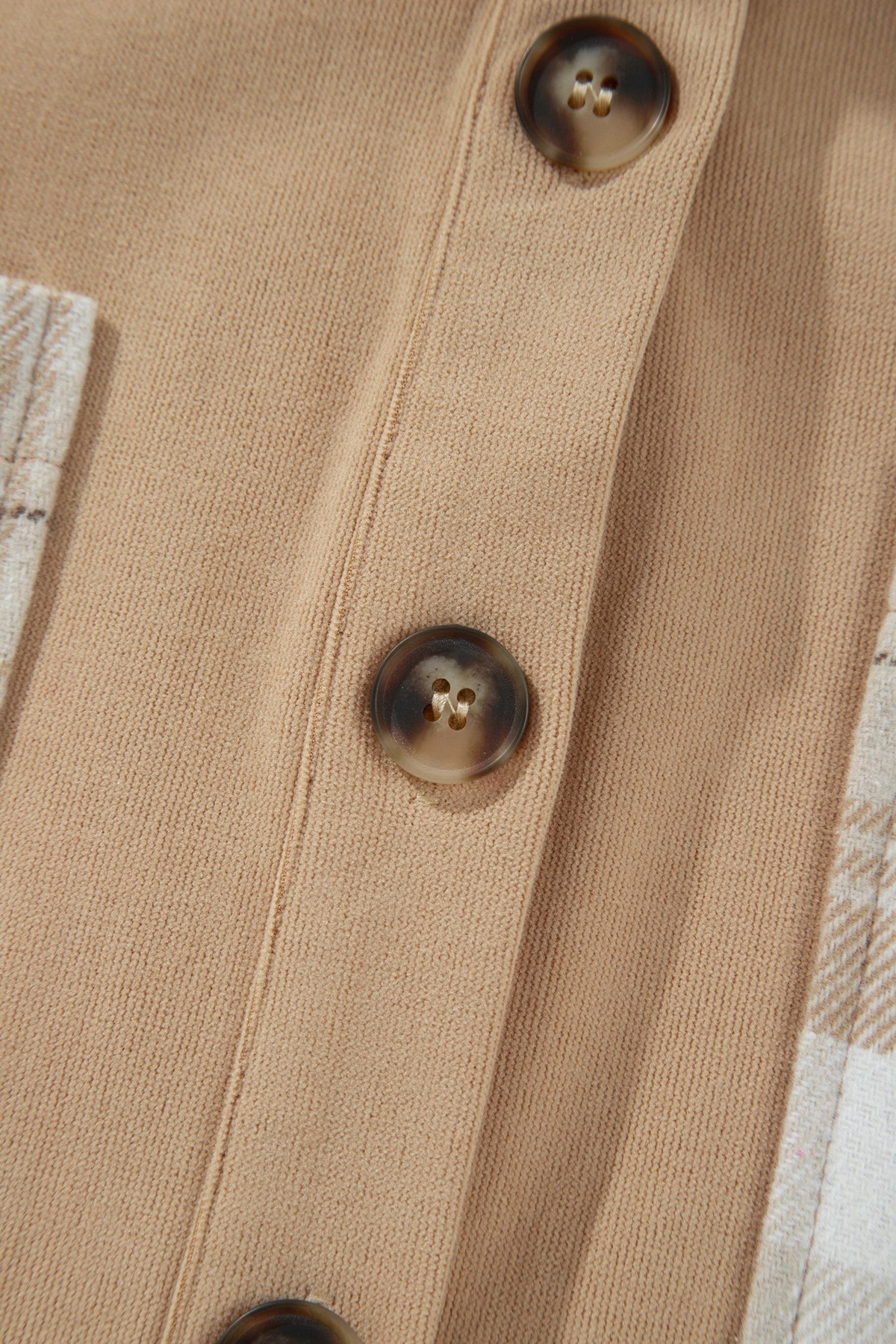 Baya Wear light French beige colorblock shacket featuring a button-front closure with brown marbled buttons.
