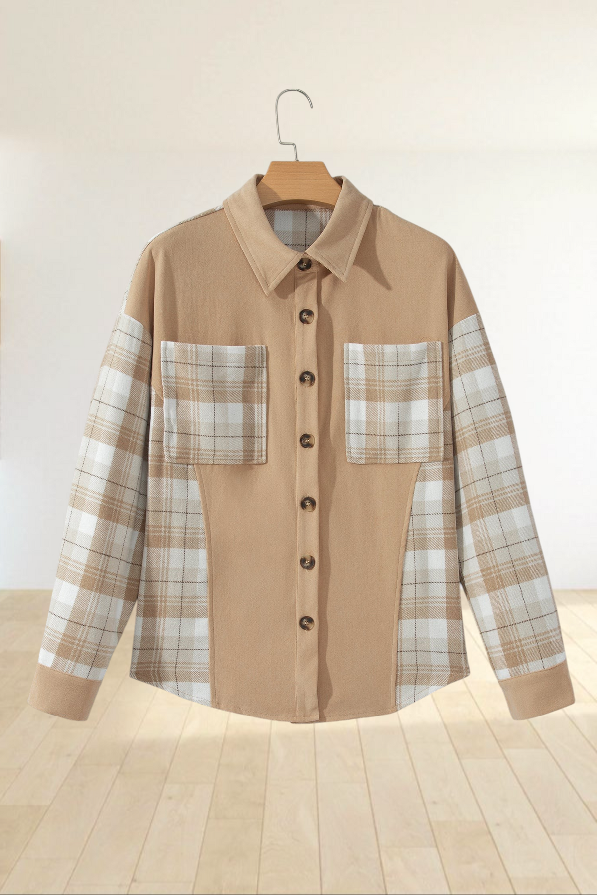 Baya Wear light French beige colorblock shacket featuring solid panels and a cream and beige plaid pattern.