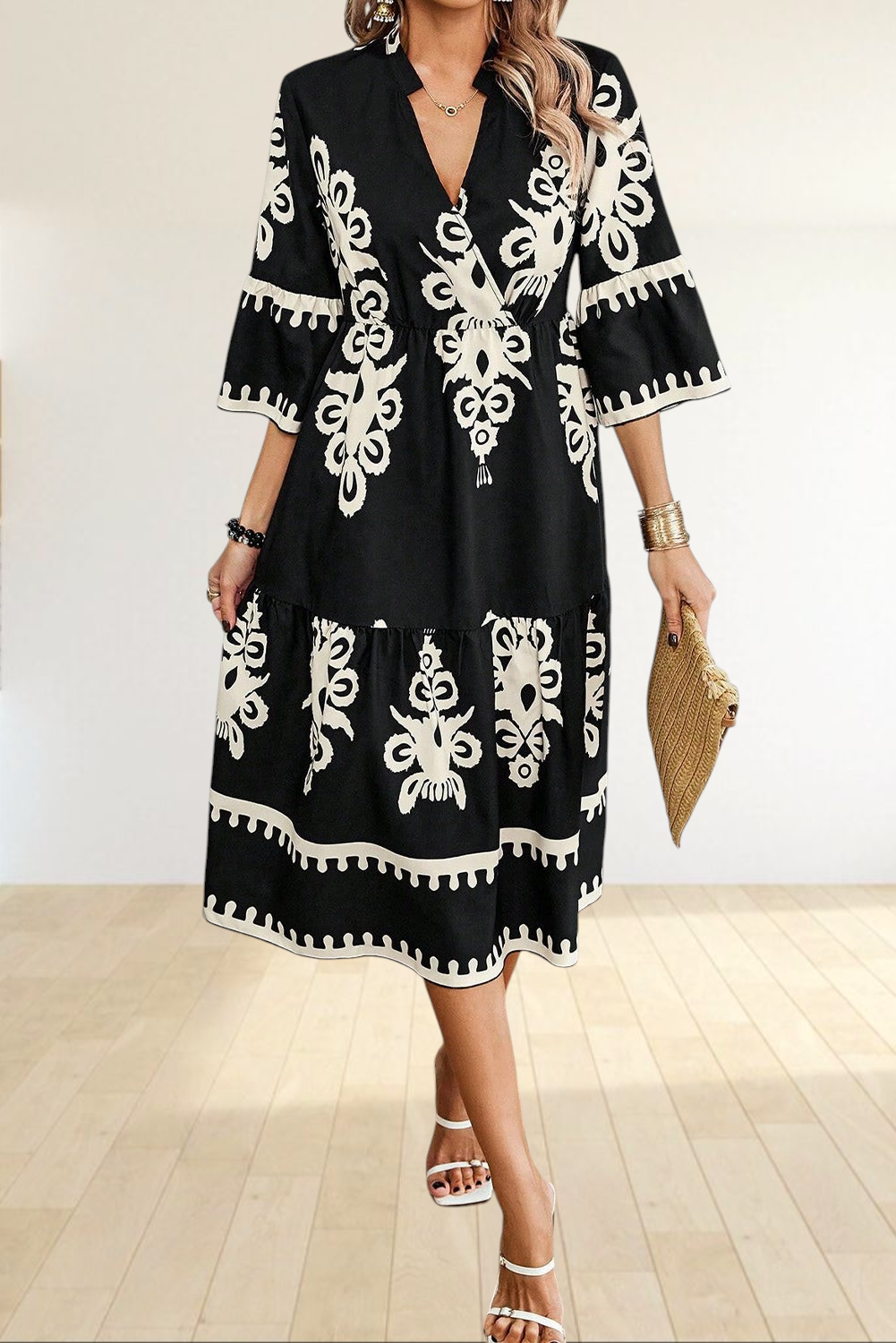 Baya Wear black and white geometric print midi dress with V-neck, 3/4 sleeves, and tiered skirt design.