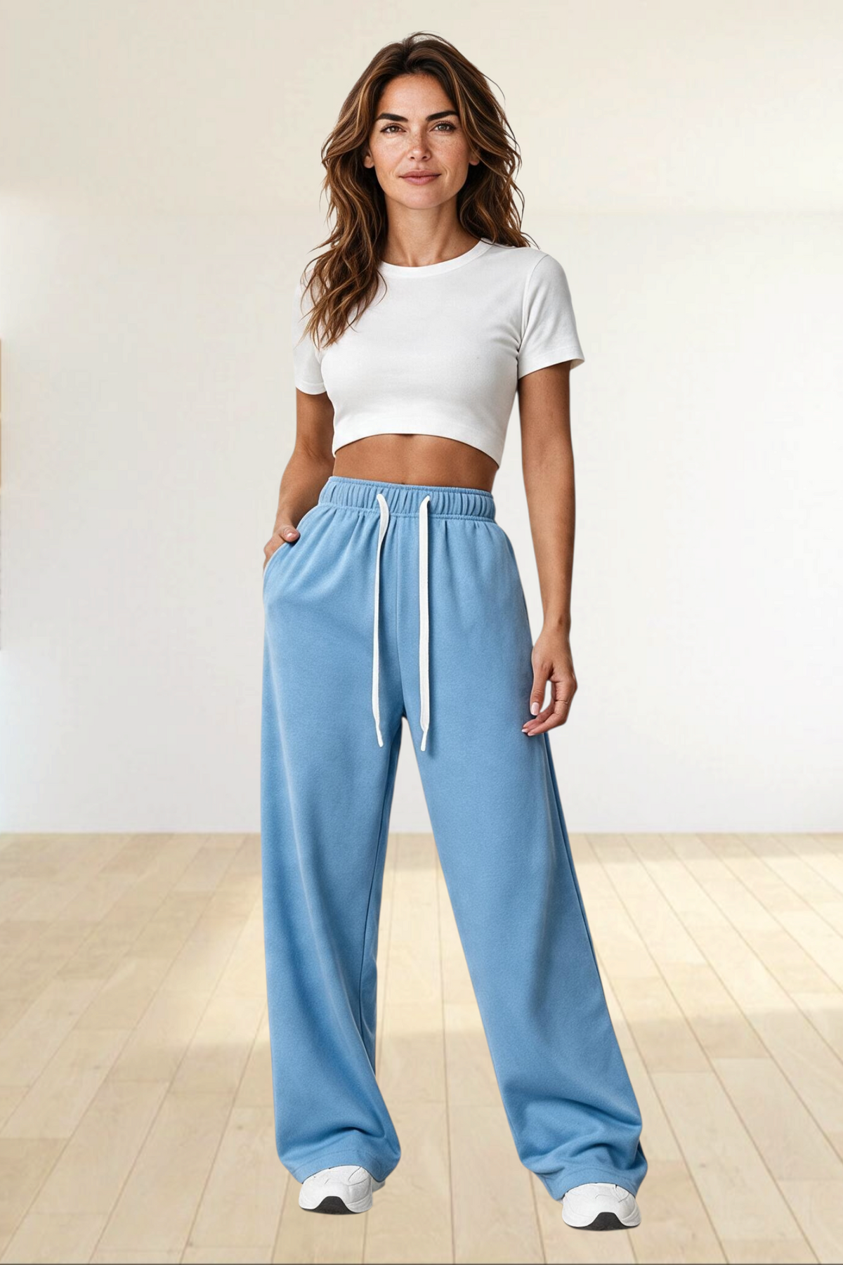 Baya Wear women's light blue wide leg lounge sweatpants in polyester fleece with an adjustable drawcord waist.