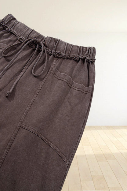 Baya Wear brown mineral wash lounge pants with a drawstring waist, elasticated waistband, and front seam detailing.