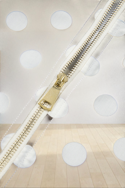 Baya Wear brown bomber jacket featuring a white polka dot print and a gold-tone metal front zipper detail.