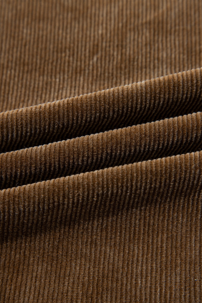 Close-up of Baya Wear camel brown corduroy fabric showing the soft, textured vertical ribbed pattern.