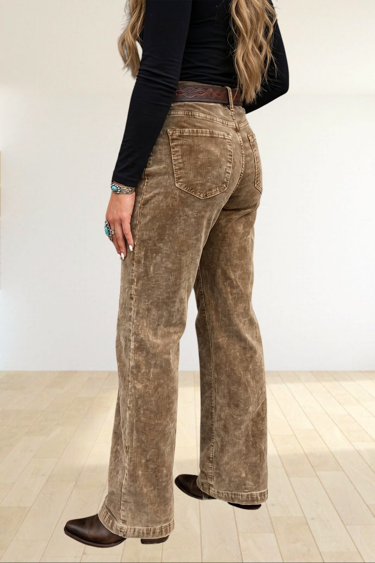 Baya Wear camel high-rise corduroy wide-leg pants worn by a woman with a western-inspired belt and boots