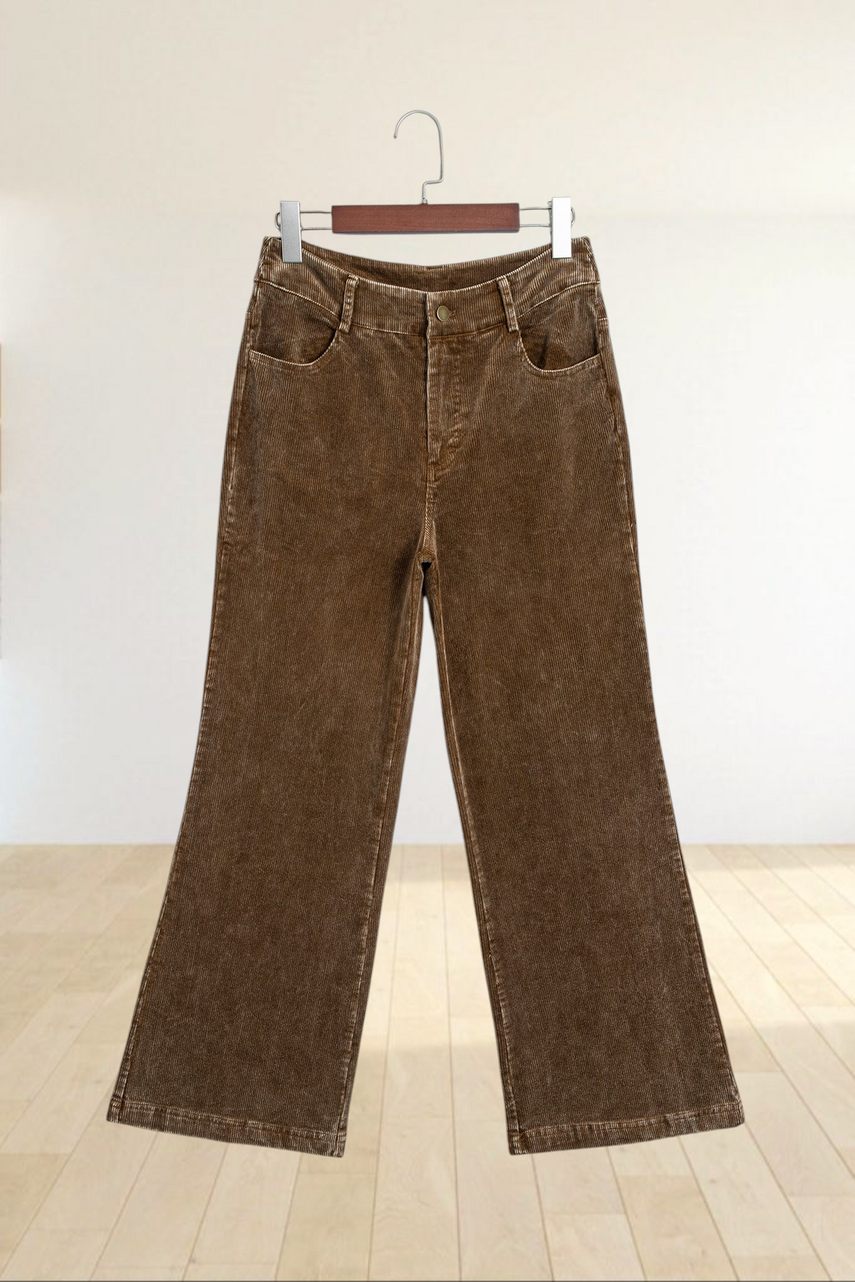Baya Wear camel corduroy wide leg pants with a high rise waist, metal button closure, and functional pockets.