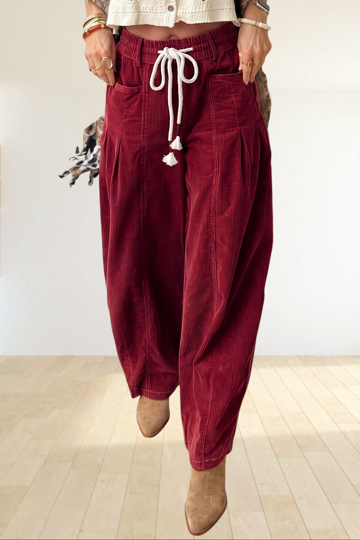 Baya Wear chestnut corduroy trousers with a wide-leg relaxed fit, elastic drawstring waist, and side pockets.