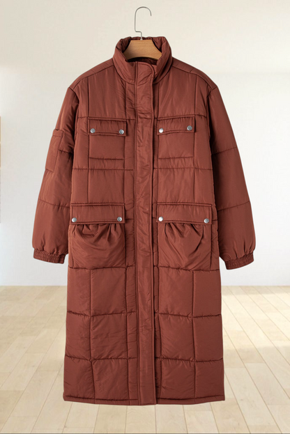 Baya Wear coffee brown mid-length quilted puffer jacket with a stand neck, zip closure, and utility flap pockets.