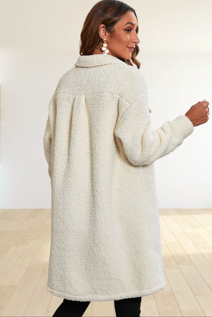 Baya Wear longline cream teddy fleece shacket worn by a woman, back view showing soft plush texture and collar detail.