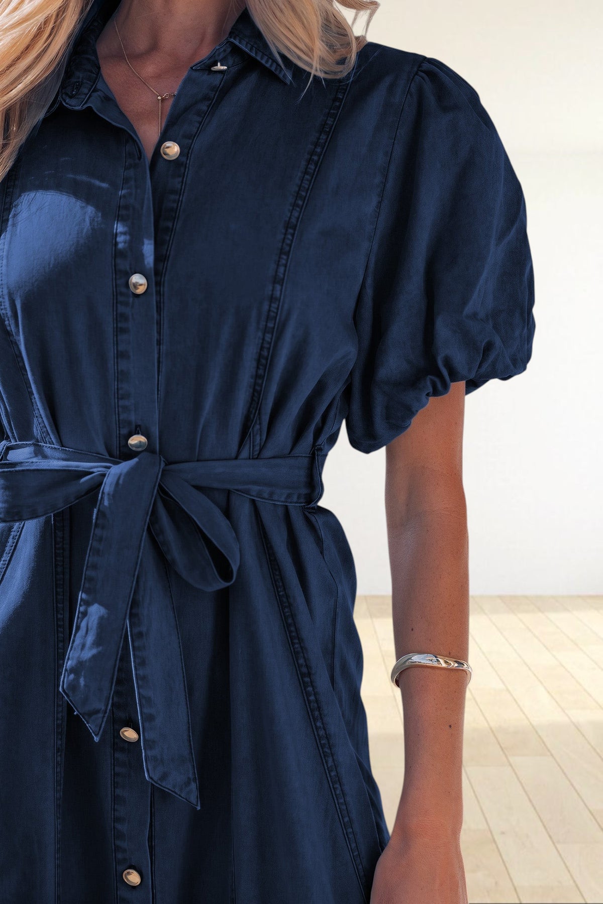 Baya Wear dark blue denim midi dress with puff sleeves, collared neckline, and a matching tie-waist belt.