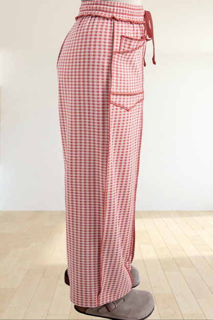 Baya Wear red and white gingham wide leg lounge pants with contrast stitching, drawstring waist, and side pockets.