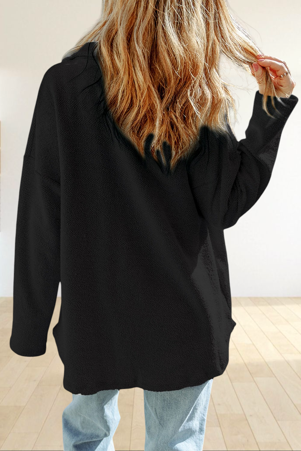 Baya Wear gray oversized textured shacket with long sleeves worn by a woman from the back view