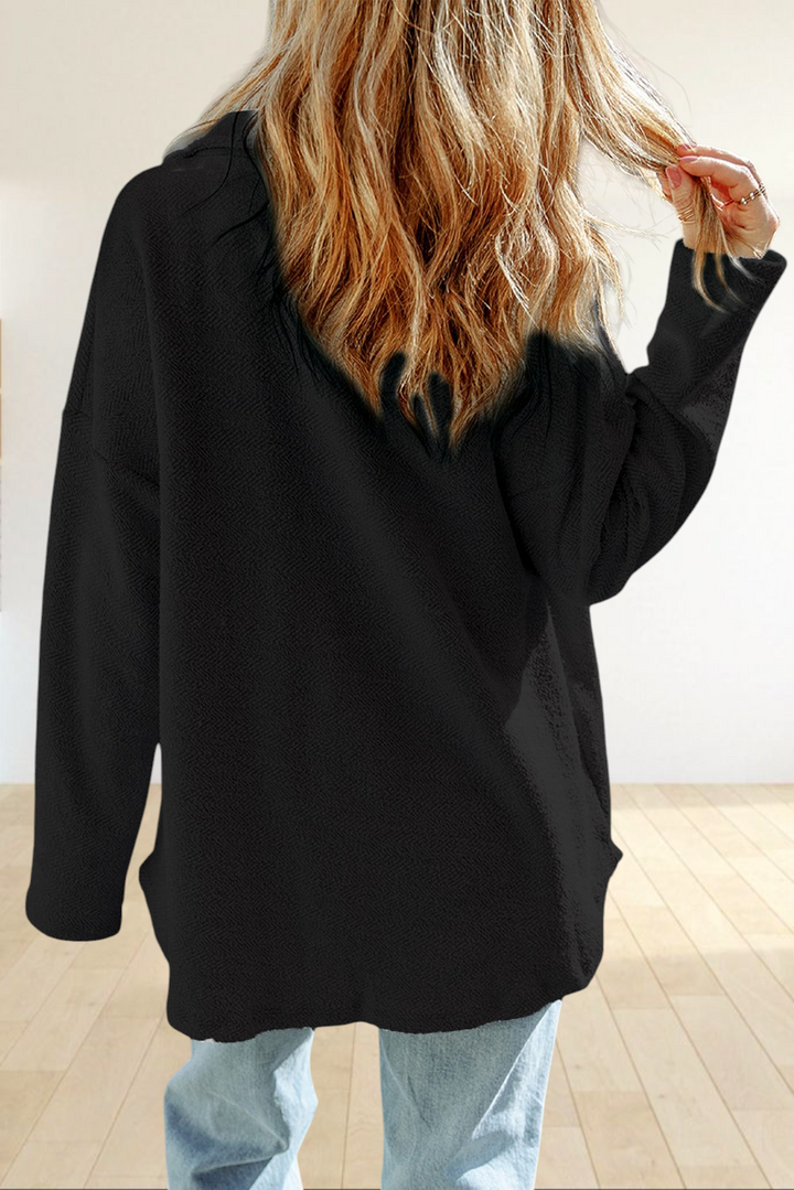 Baya Wear gray oversized textured shacket with long sleeves worn by a woman from the back view