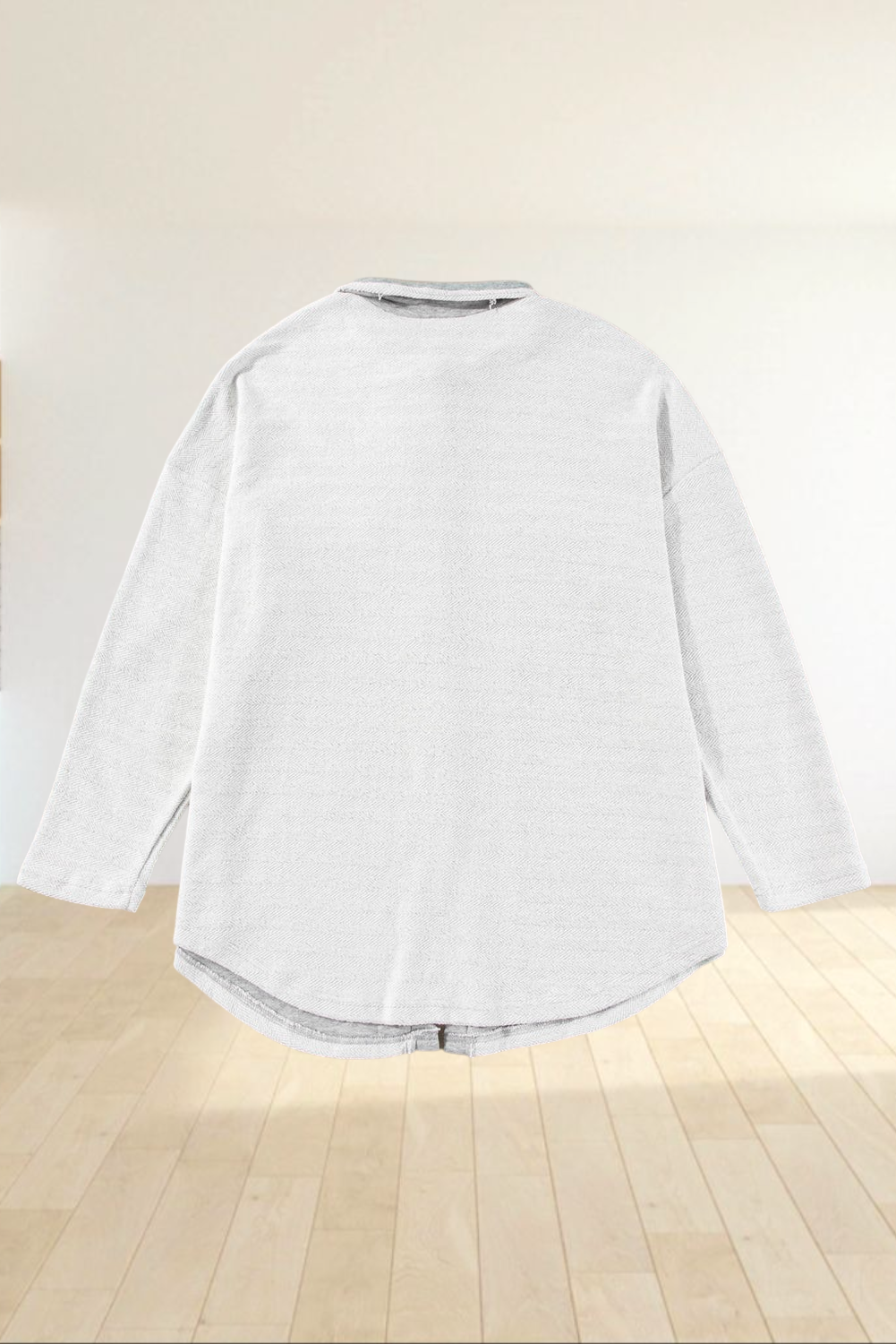 Back view of Baya Wear gray textured shacket with a relaxed oversized fit and curved hemline.