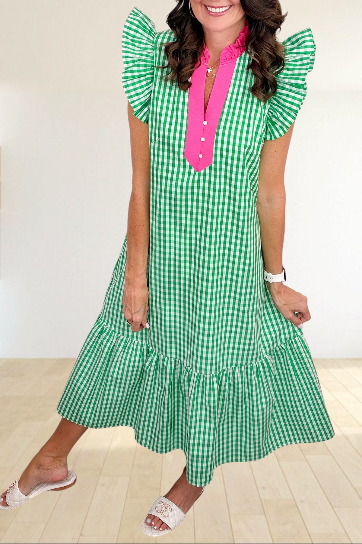 Baya Wear green and white gingham midi dress with hot pink collar, flutter sleeves, and tiered ruffle hem on a model