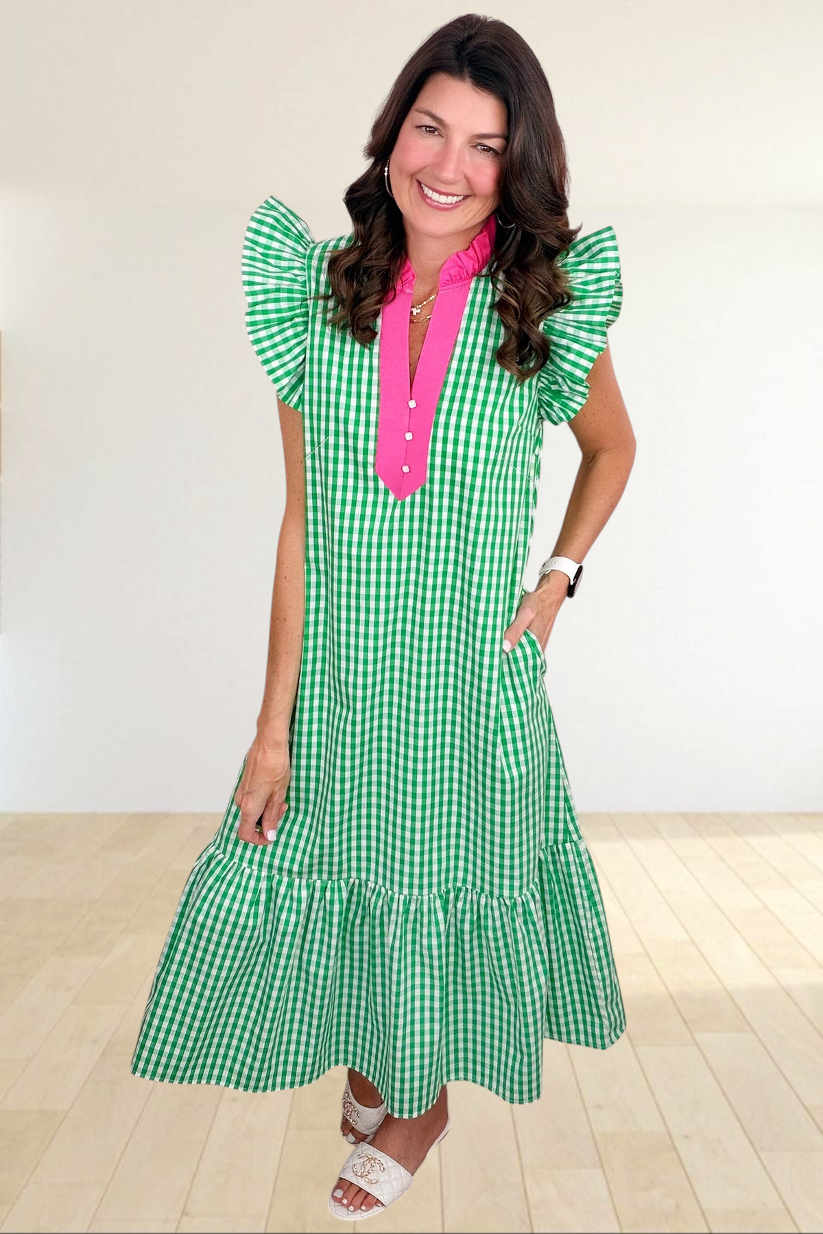 Baya Wear green and white gingham midi dress with hot pink collar, flutter sleeves, and tiered ruffle hem.