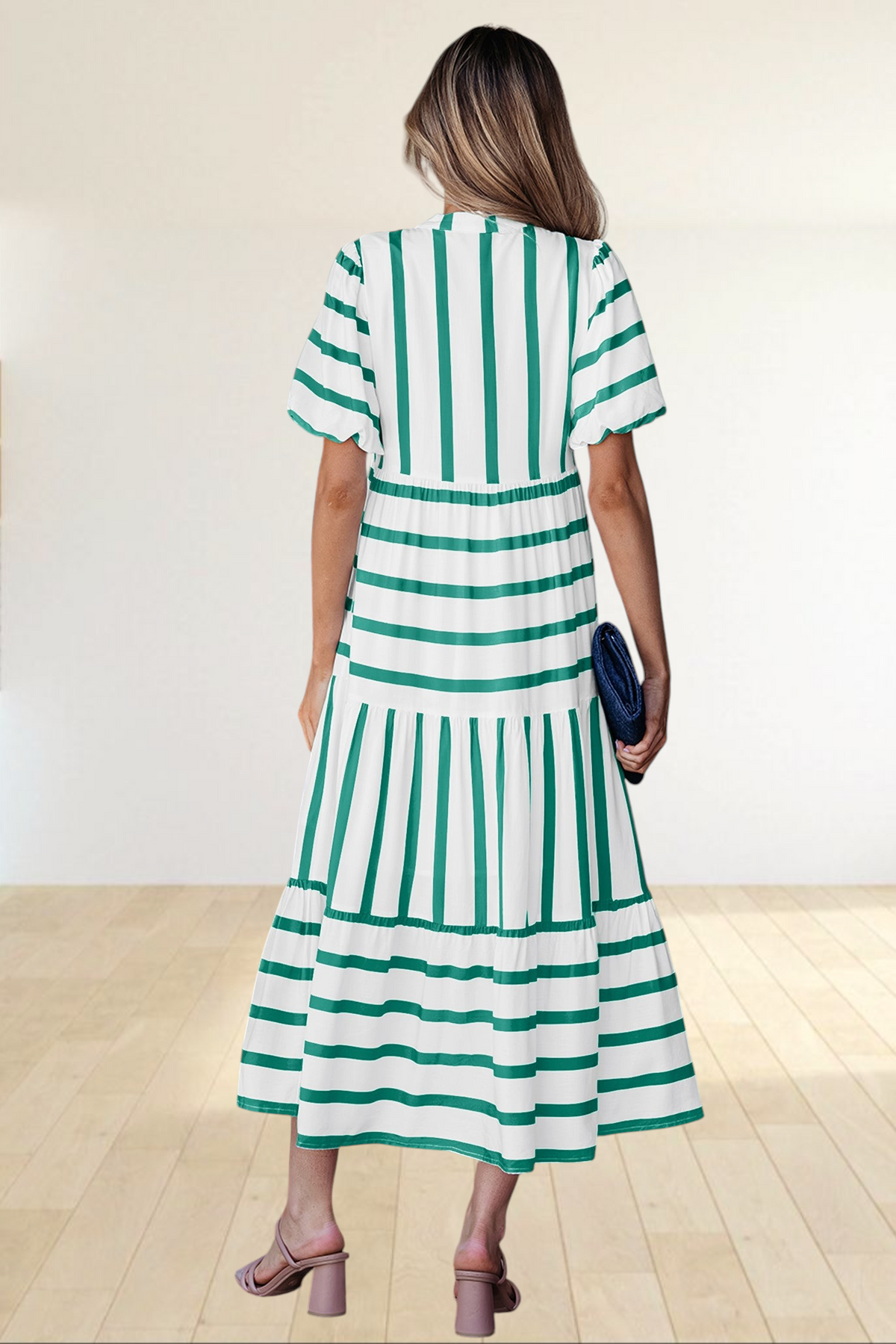 Baya Wear tiered midi dress in white with green vertical stripes, featuring half sleeves and a relaxed fit.