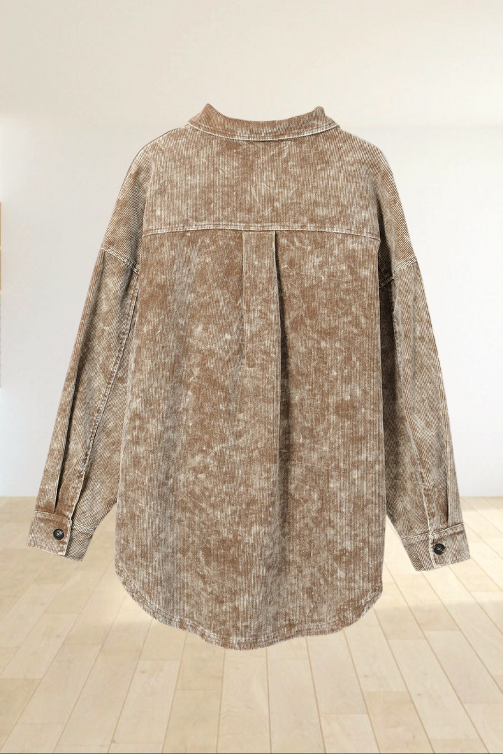 Baya Wear khaki mineral wash corduroy shacket with a relaxed oversized fit and curved hemline, back view.