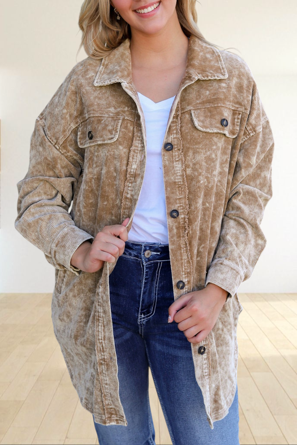 Baya Wear khaki mineral wash corduroy shacket with button-down front and chest pockets on a smiling model