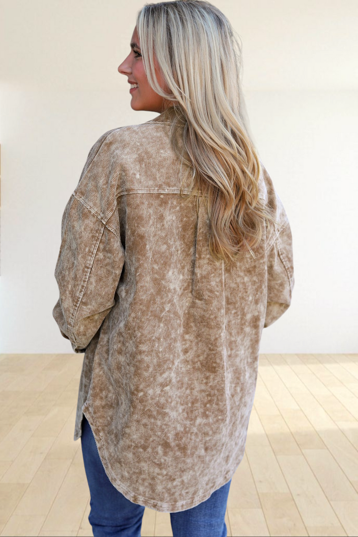 Baya Wear khaki mineral wash corduroy shacket worn by a blonde woman, featuring a relaxed fit and curved hem.