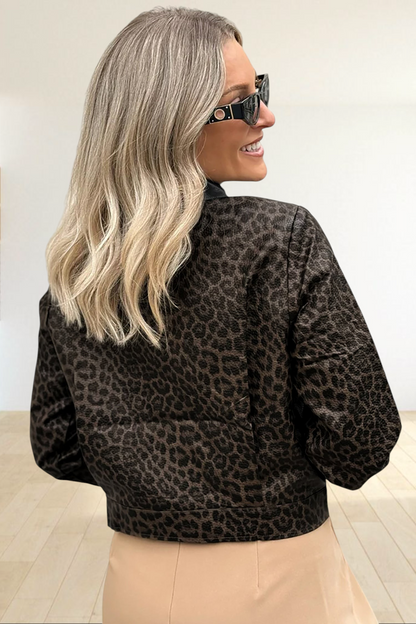 Baya Wear leopard print cropped jacket with a black collar worn by a blonde woman in sunglasses, back view.