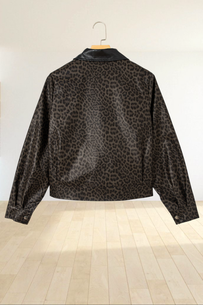 Baya Wear leopard print cropped jacket with a solid black collar, shown from the back on a hanger.