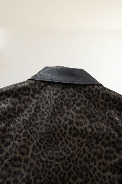 Baya Wear leopard print jacket featuring a textured animal pattern and a contrasting solid black leather-look collar.
