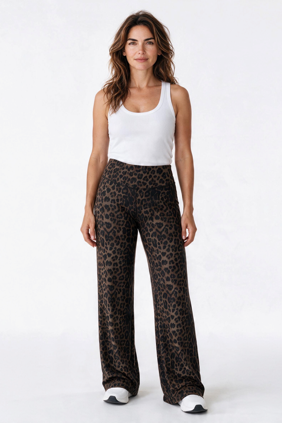 Baya Wear high-waisted wide leg yoga pants in a brown leopard print, worn by a model with a white tank top.
