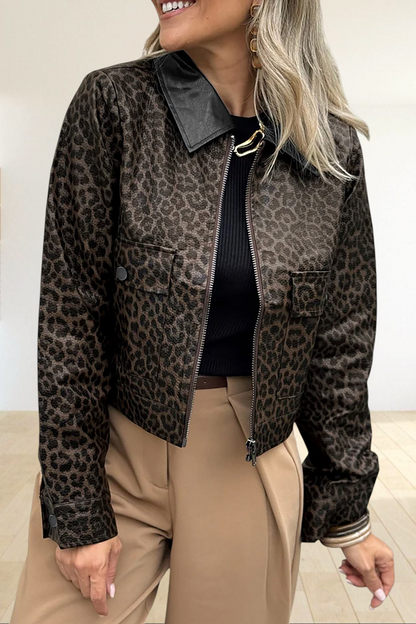 Baya Wear cropped leopard print jacket with a black collar, metal zip-up front, and snap-button pockets.
