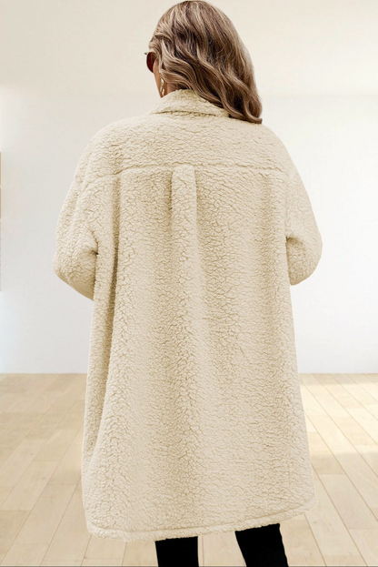 Back view of a woman wearing a Baya Wear longline cream teddy fleece shacket with a cozy textured finish