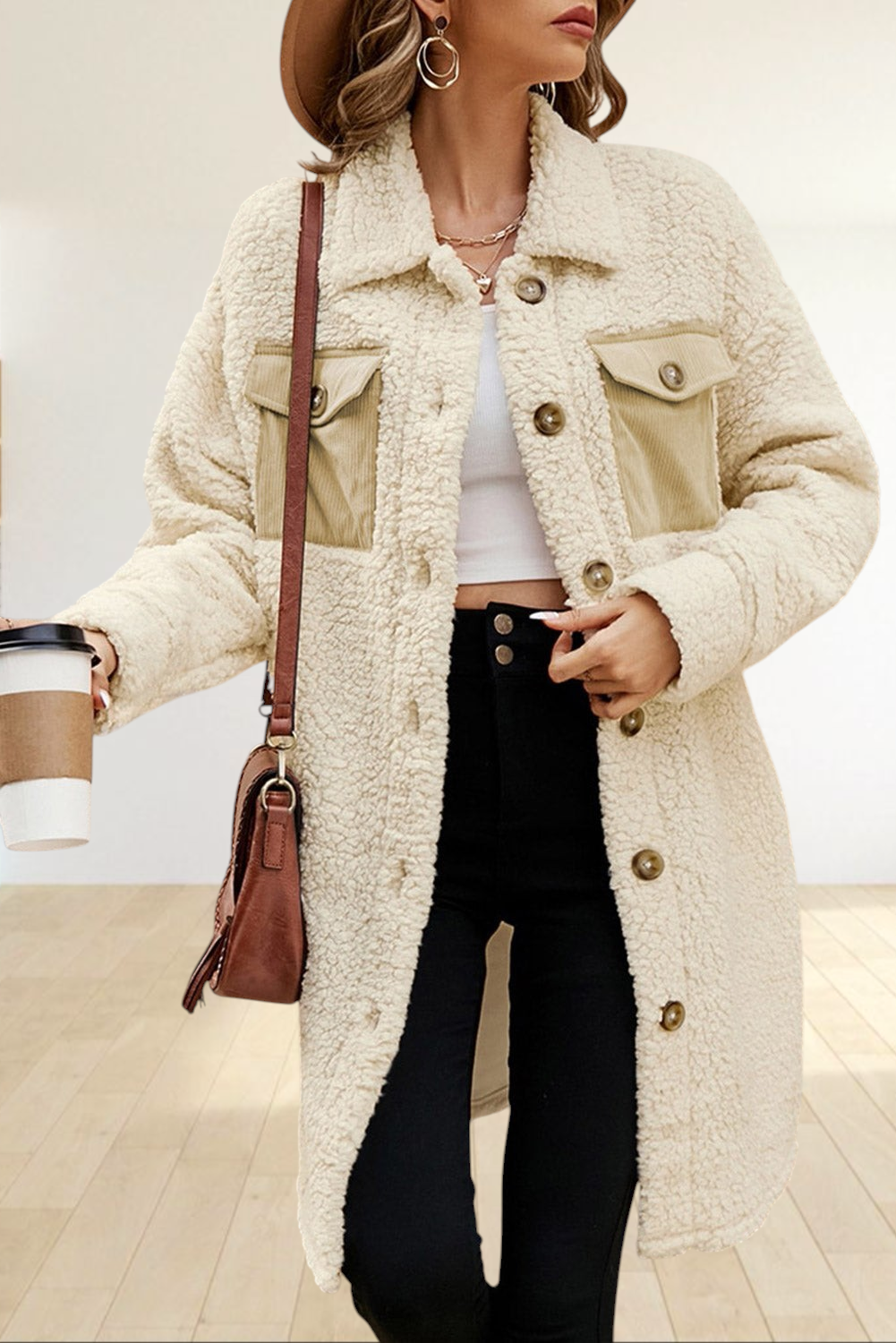 Baya Wear longline cream teddy fleece shacket with contrast corduroy chest pockets and button-front closure.