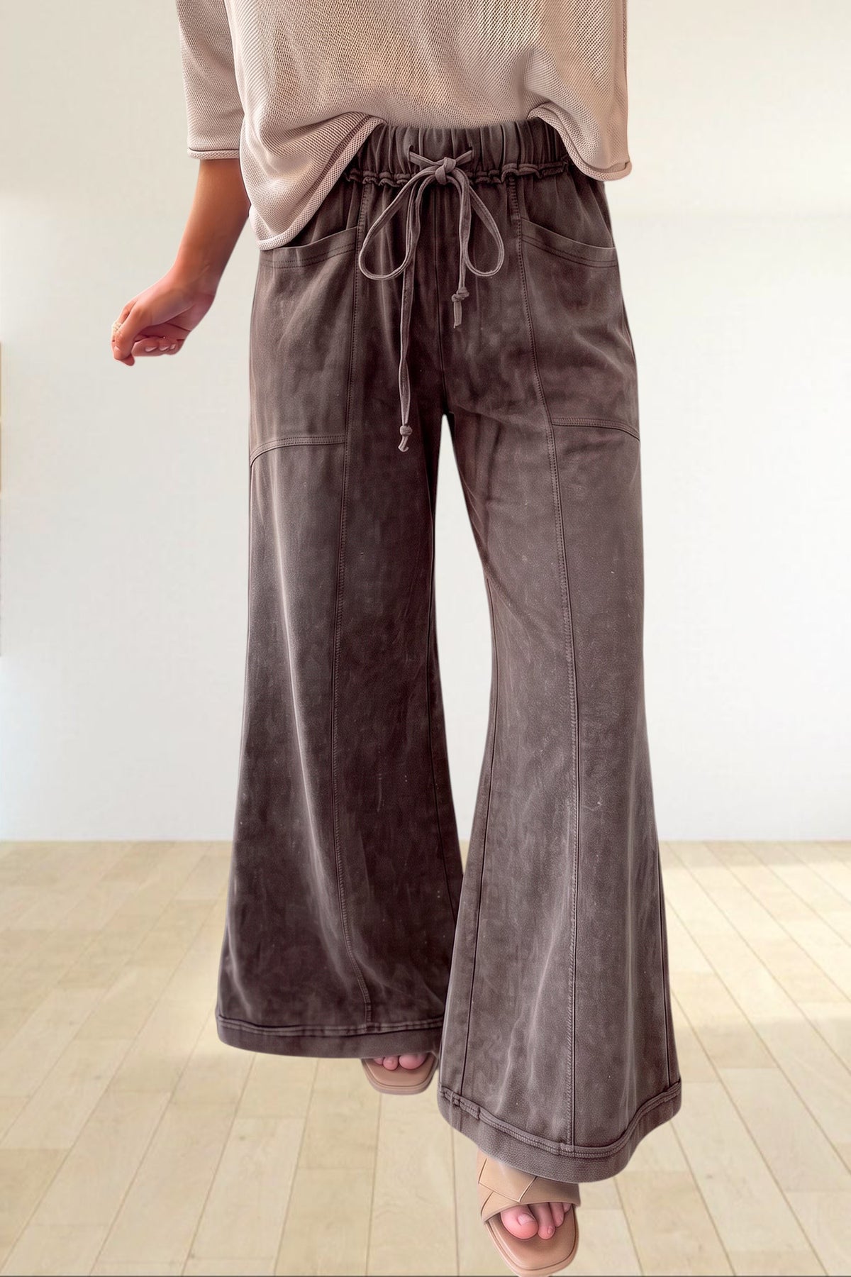 Baya Wear mineral wash flare leg lounge pants in dark grey with drawstring waist and seam detail