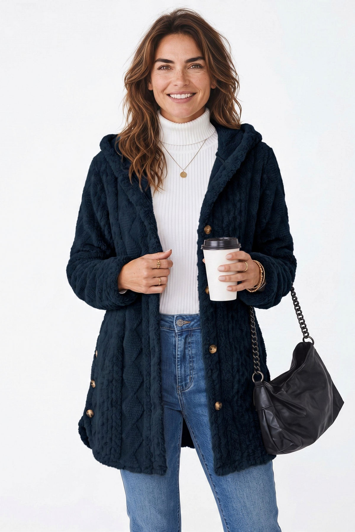 Baya Wear navy blue longline hooded fleece cardigan with cable texture and decorative side buttons on a smiling model