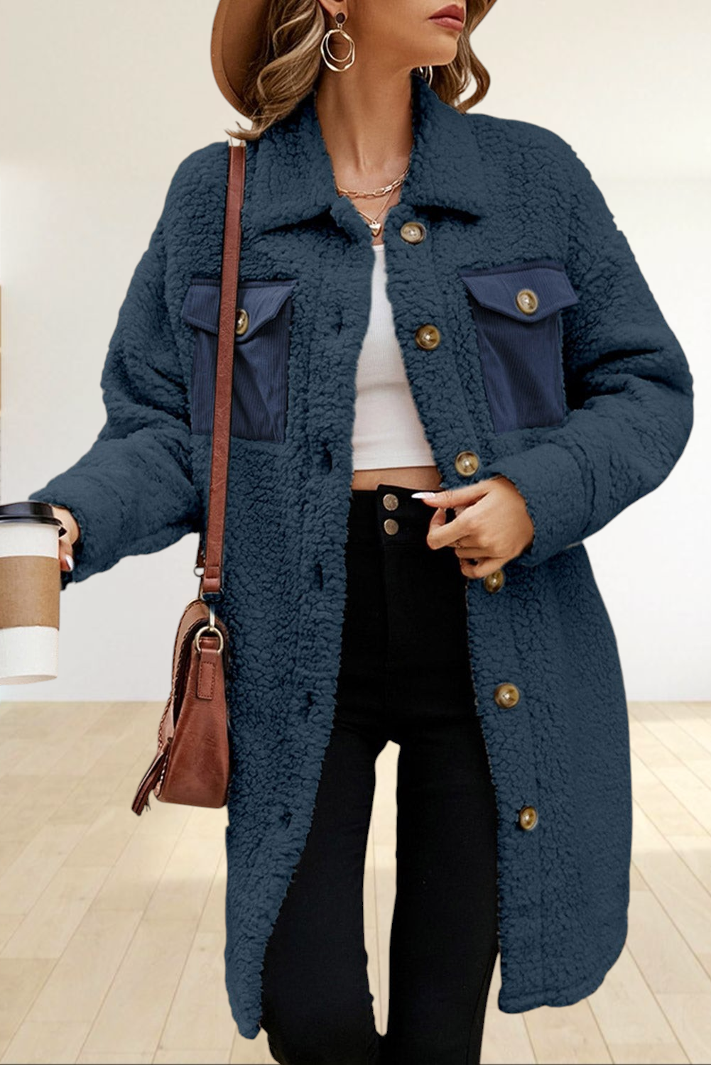 Baya Wear longline navy teddy fleece shacket with contrast corduroy chest pockets and button-front closure.