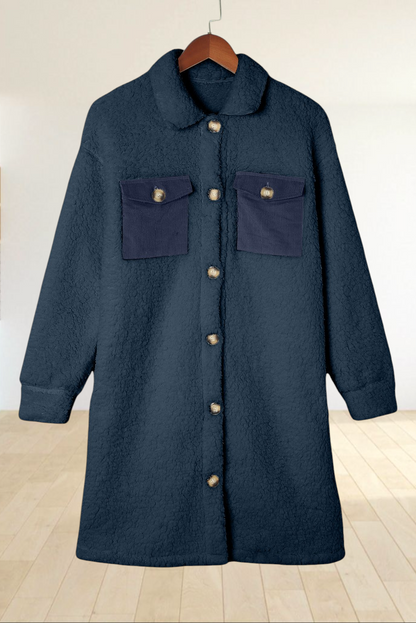 Baya Wear longline navy blue teddy fleece shacket with contrast corduroy chest pockets and button-front closure.
