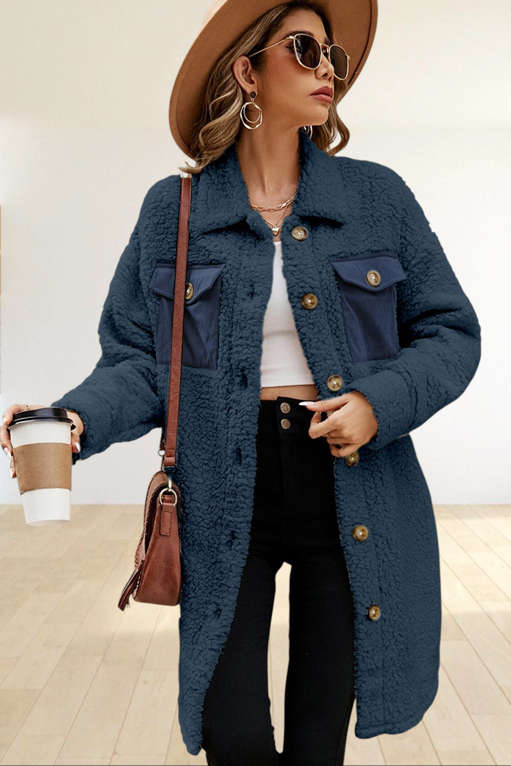 Baya Wear longline navy teddy fleece shacket with contrast corduroy chest pockets and button-front closure.