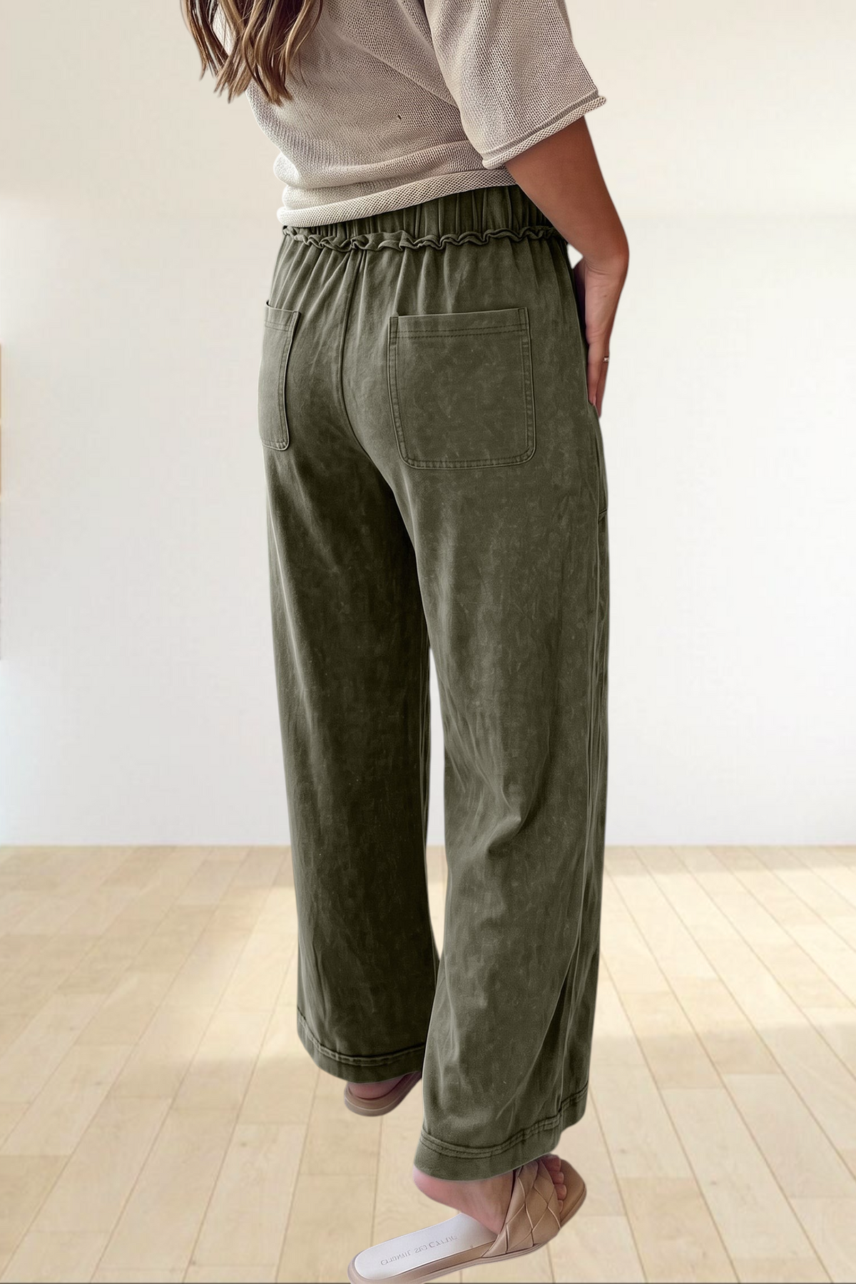 Baya Wear olive green mineral wash wide leg lounge pants with a ruffled drawstring waist and back pockets