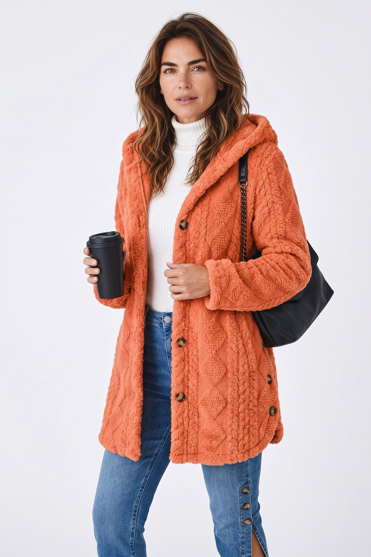 Baya Wear orange hooded fleece cardigan with cable texture, button front, and decorative side buttons on a model.