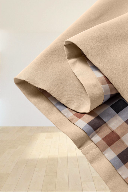 Baya Wear parchment beige cropped jacket sleeve detail showing the hidden plaid patterned interior lining