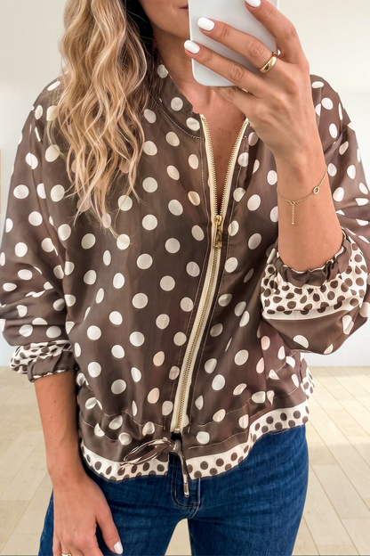 Baya Wear brown polka dot zip-up bomber jacket with gold hardware, tie-waist, and contrast cuff detail.