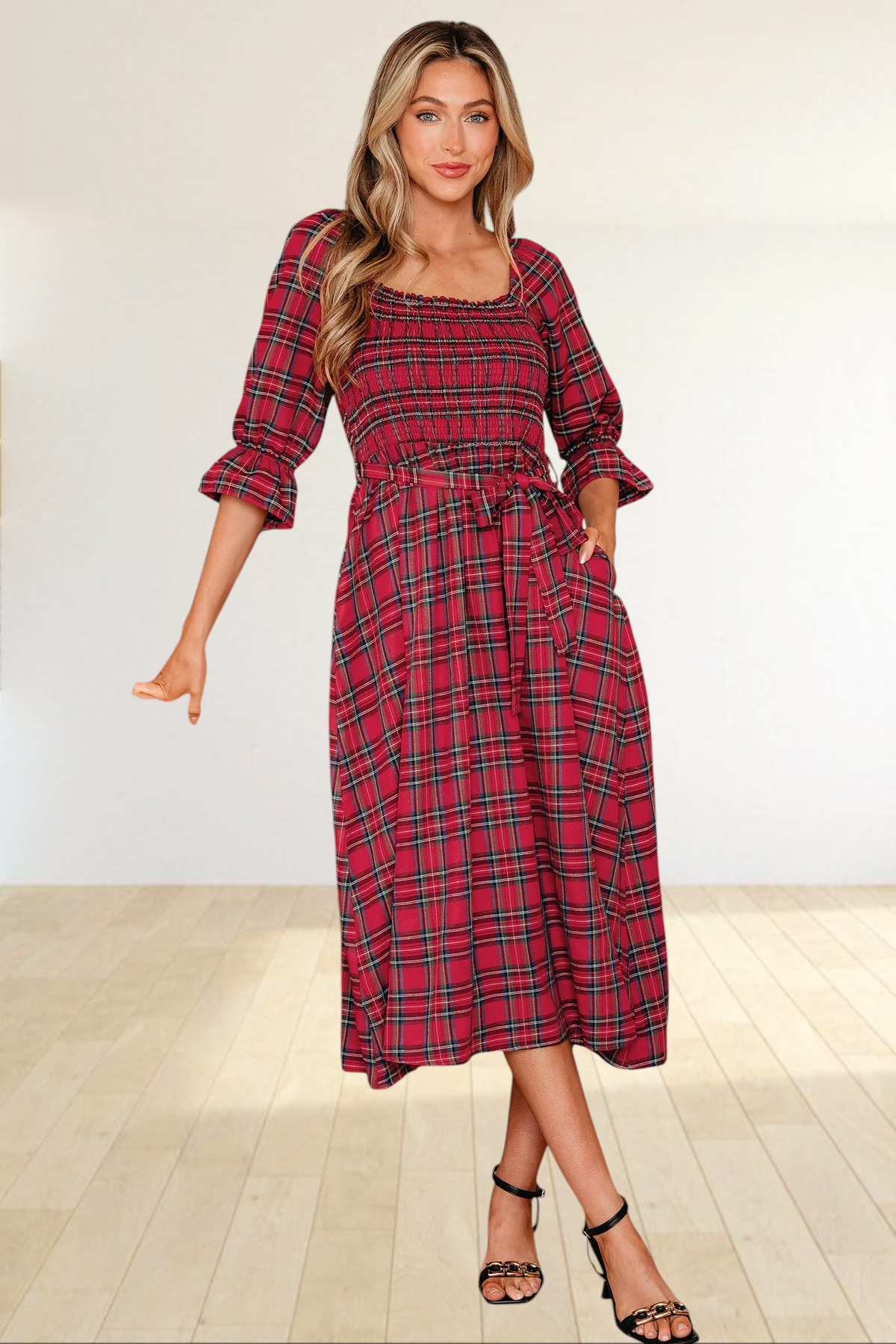 Baya Wear red tartan plaid midi dress with smocked bodice, puff sleeves, and waist tie worn by a blonde model.