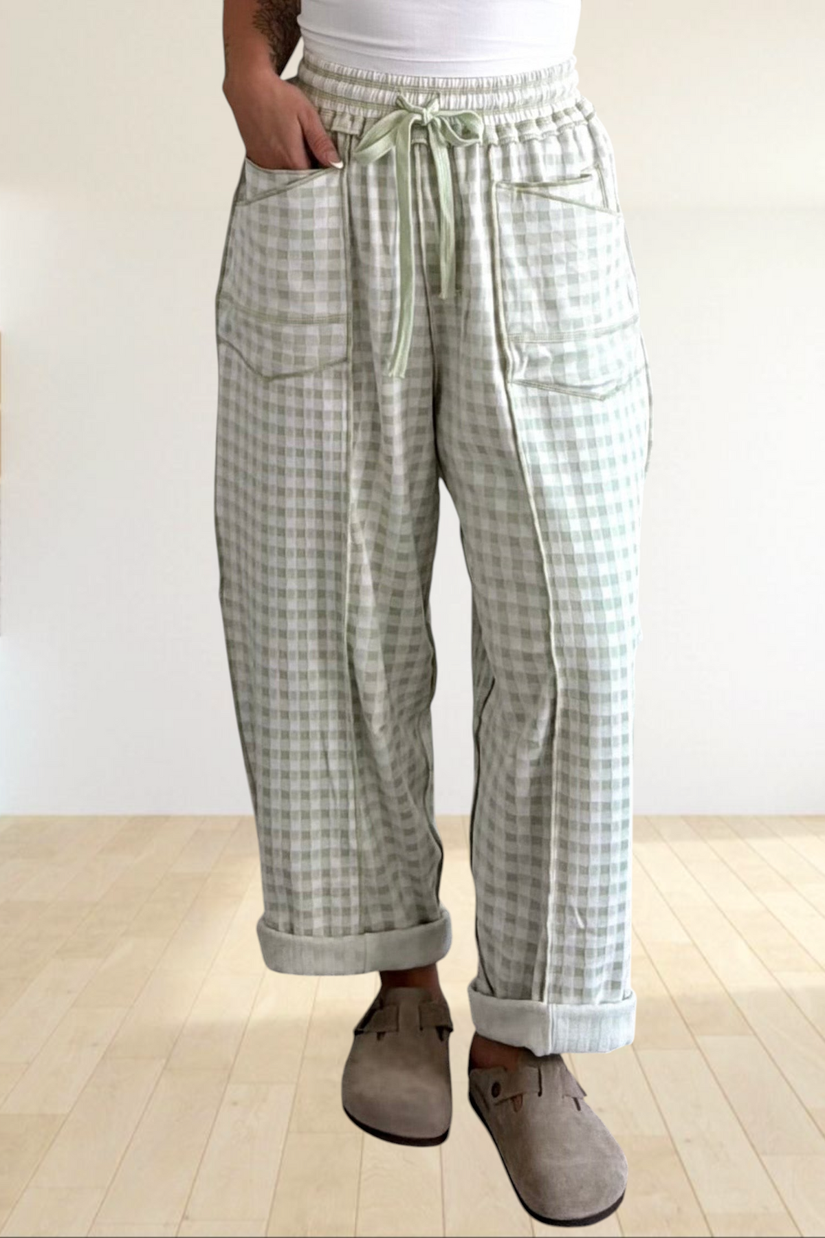 Baya Wear sage green gingham wide leg lounge pants with drawstring waist, contrast stitching, and front pockets.