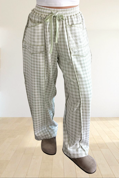 Baya Wear sage green gingham wide leg lounge pants with drawstring waist, contrast stitching, and front pockets.