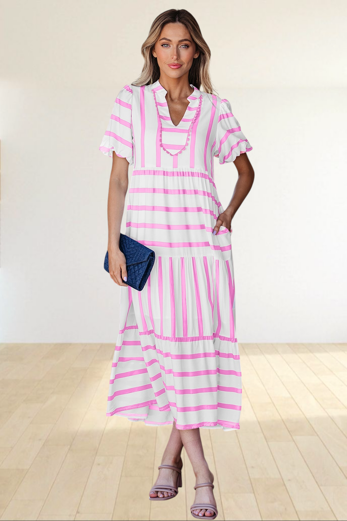 Baya Wear tiered midi dress in white with pink stripes, featuring a notched neckline with ricrac trim and pockets.