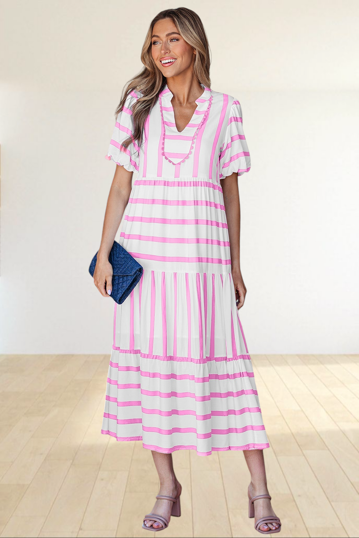 Baya Wear tiered midi dress in white with pink stripes, featuring a notched neckline, ricrac trim, and side pockets.