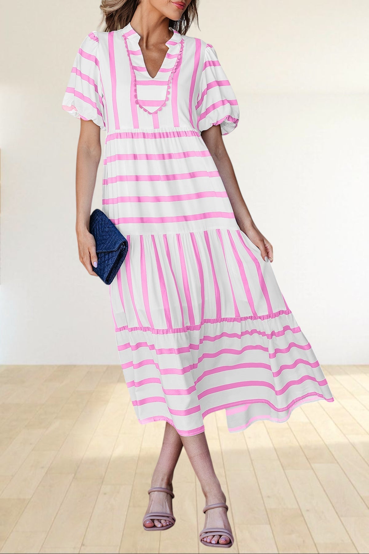 Baya Wear tiered midi dress in white and pink stripes with a notched neckline, ricrac trim, and half sleeves.