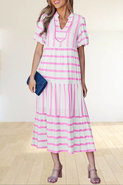 Baya Wear tiered midi dress in white and pink stripes with a notched neckline, ricrac trim, and half sleeves.